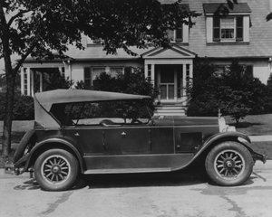 DuPont Automobile on Front of House, c.1919-30 by American Photographer